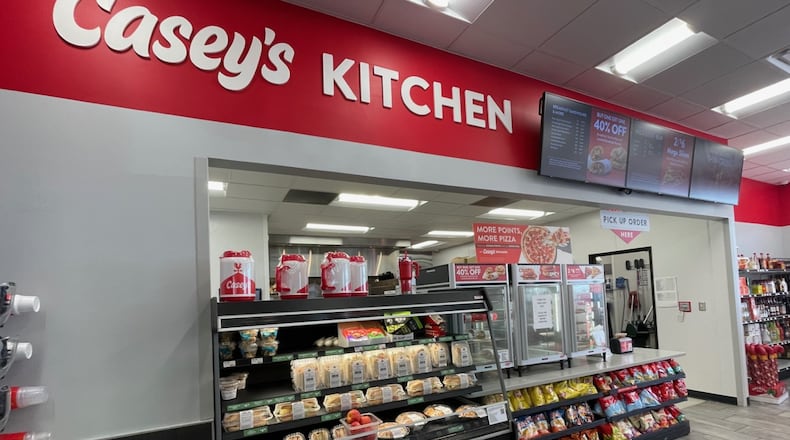 This is the kitchen inside Casey's on Princeton Road in Fairfield Twp., near Menard's. A manager working there said they will pretty much make anything a hungry patron requests and its most popular choice is pizza. STAFF PHOTO
