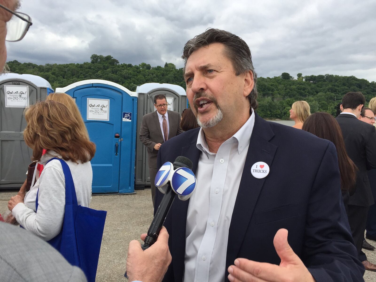 Kevin W. Burch, president of Jet Express, Inc. and chairman of the American Trucking Associations, is interviewed by WHIO-TV reporter Jim Otte after President Donald Trump’s speech in Cincinnati on Wednesday.