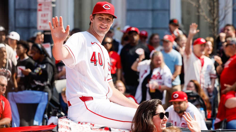 Former Cincinnati Reds catcher Johnny Bench signals to the crowd as during the 107th Findlay Market Opening Day Parade on March 26, 2026. NICK GRAHAM/STAFF