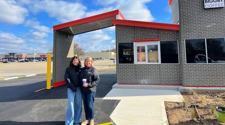 Biggby Coffee is holding a grand opening for its newest store in the Dayton region at 5894 N. Springboro Pike in Miami Twp. on Tuesday, Dec. 19. Pictured is owner Laynae Meyer and her daughter, Raegan.