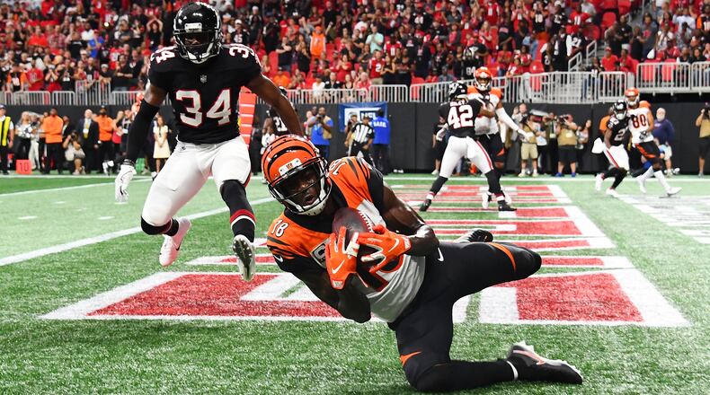 ATLANTA, GA - SEPTEMBER 30: A.J. Green #18 of the Cincinnati Bengals catches the game winning touchdown pass during the fourth quarter against the Cincinnati Bengals at Mercedes-Benz Stadium on September 30, 2018 in Atlanta, Georgia. (Photo by Scott Cunningham/Getty Images)