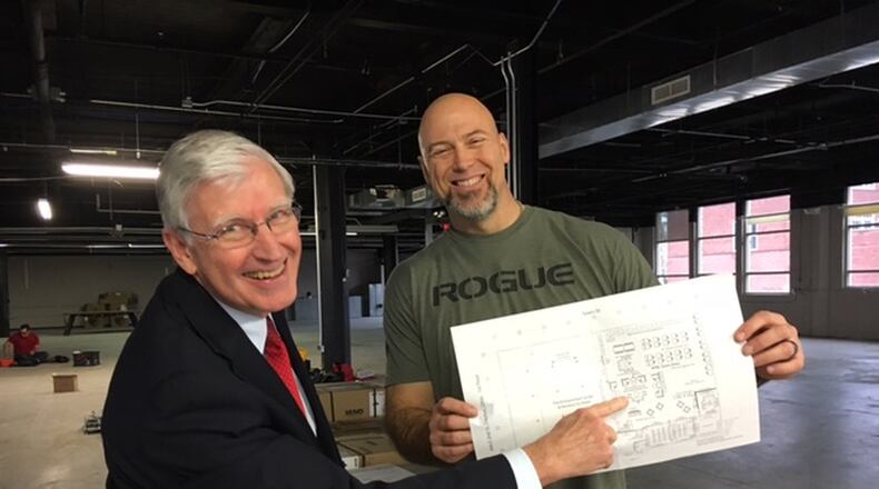 Les McFawn, director of the Wright Brothers Institute, left, and Jim Masonbrink, director of the Small Business Hub at the Wright Brothers Institute, are excited about plans for the new small business hub at 444 E. Second St. THOMAS GNAU/DAYTON