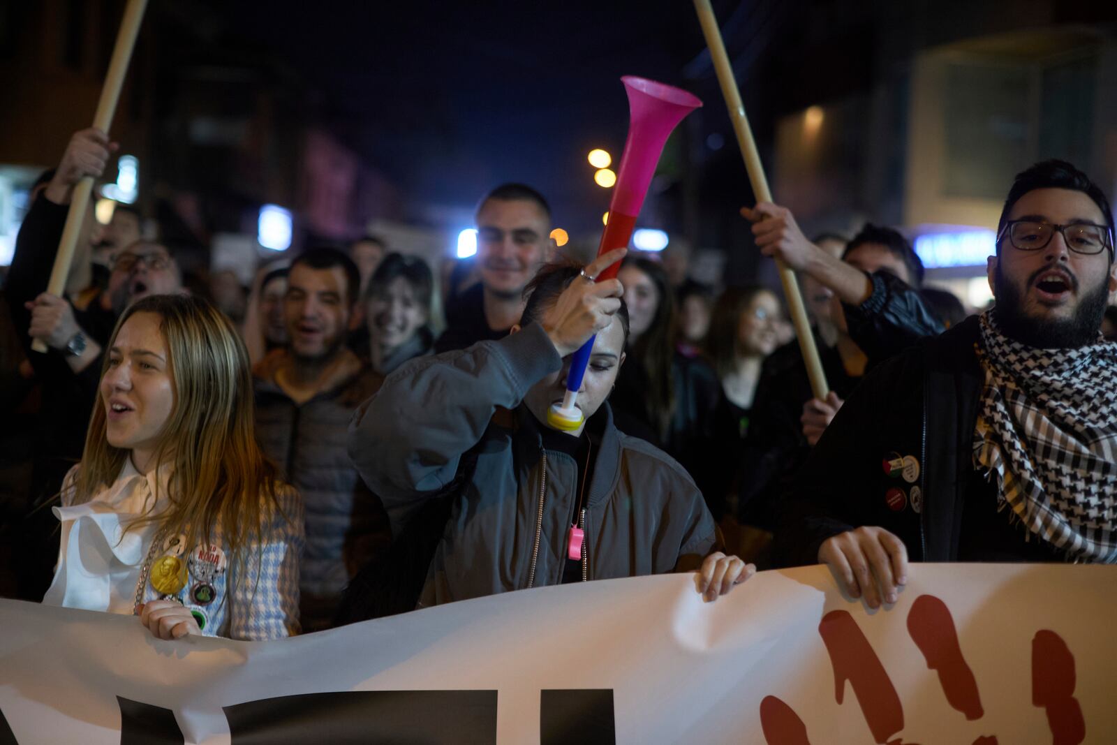 Students chant during an anti-corruption protest in the southwestern town of Novi Pazar, Serbia, Friday, April 11, 2025. (AP Photo/Marko Drobnjakovic)
