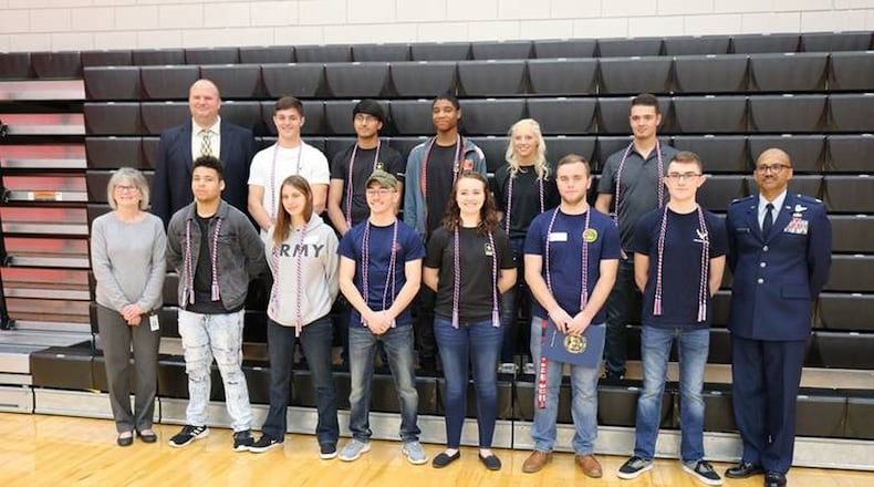 Upper row, from left: Wayne High School Principal Jeff Berk, Justin Kissee (Army), Abhi Lekhi (Army), Philip Waters (Army), Kelsey Sherlock (Army National Guard), Caleb Pequignot (Air Force). Lower row from left: Superintendent Susan Gunnell, Demetrius McFadden (Army), Zoe Watkins (Army), Isaac Burgess (Marines), Brianna Gallagher (Army), Conner Teague (Navy), John Boyles (Air Force), Lt. Col. Roger Redwood.