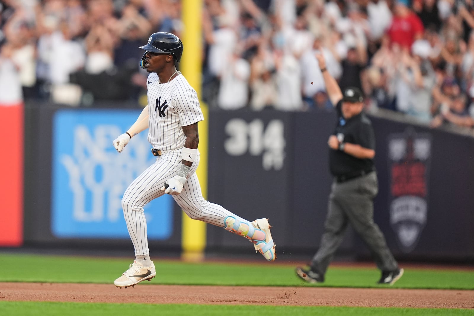 New York Yankees' Jazz Chisholm Jr. runs the bases after hitting a three-run home run during the first inning of a baseball game against the Boston Red Sox, Friday, June 6, 2025, in New York. (AP Photo/Frank Franklin II)
