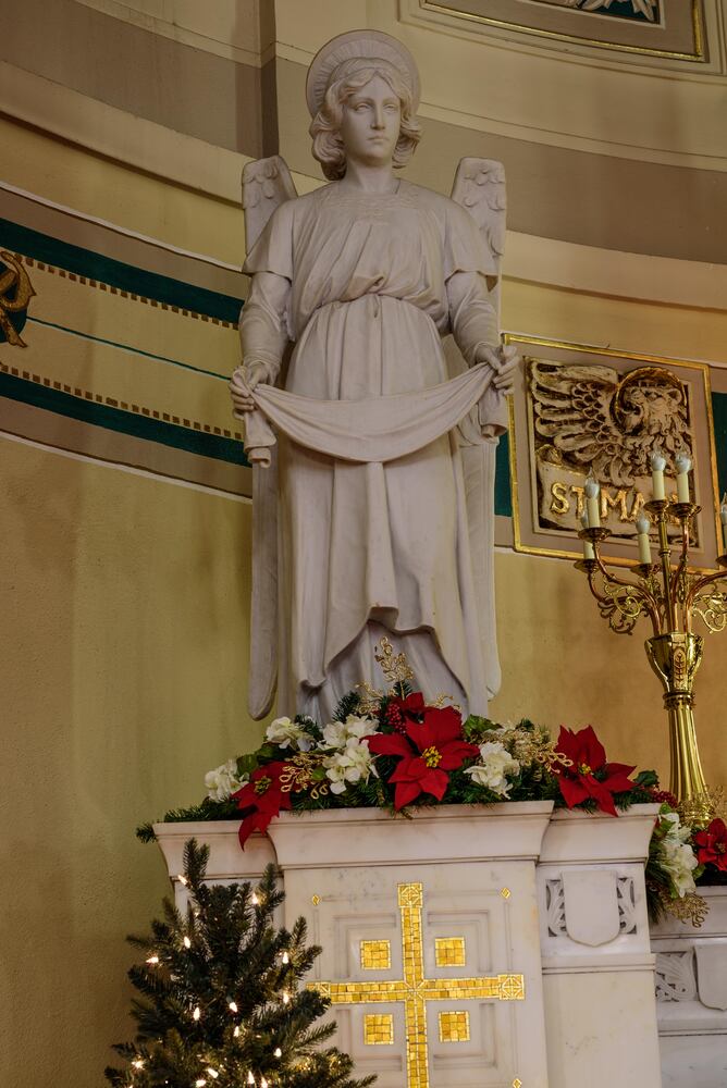 PHOTOS: Christmas Eve morning at St. Joseph Catholic Church in downtown Dayton