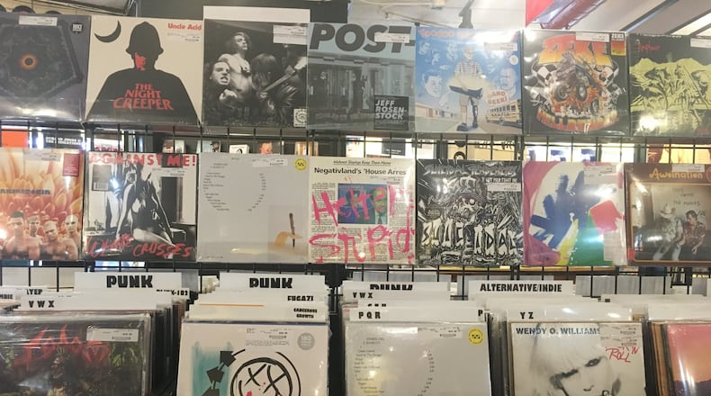 Omega Music in Dayton is celebrating 35 years. ALEX PERRY/STAFF