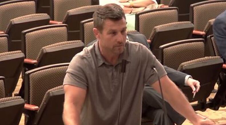 Resident Ed Standifer appeals to Springboro City Council not to build a road next to his driveway onto Ohio 741. STAFF/LAWRENCE BUDD