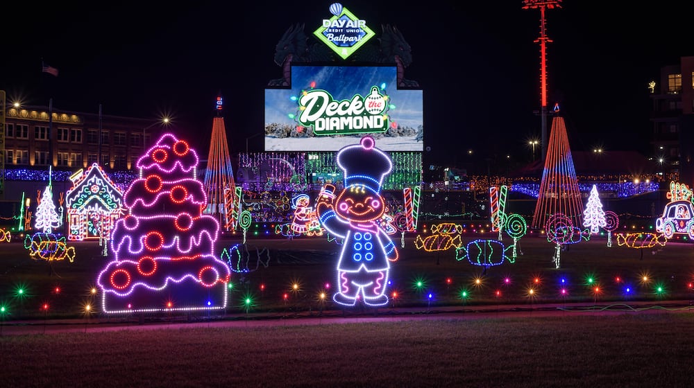The first season of Deck the Diamond, a new Dayton holiday tradition at Day Air Ballpark, home of the Dayton Dragons, started on Nov. 14 and continues through Jan. 3, 2026. The family-friendly 45-night ticketed event features a winter wonderland of lights and decorations, tasty holiday treats and beverages, holiday shopping, the North Pole Express, a 44-foot-tall Christmas tree, photos with Santa and more. TOM GILLIAM/CONTRIBUTING PHOTOGRAPHER