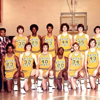 The 1975-76 Wright State Raiders included: (Front row, left to right) Alan McGee, Neil Reif, Lyle Falknor, Rick Martin (now known as Abdul Shakur Ahmad), Steve Shook, Curt Shellabarger, Ken Millisor and manager Scott Oldiges. (Back row, left to right) trainer David Shon, head coach Marcus Jackson, Bob Grote, Edgar Johnson, Dan Huguely, Guy Conners, Bob Schaefer, Bob Cook, Don Person, and assistant coaches Jerry Holbrook and Jim Brown. CONTRIBUTED PHOTO