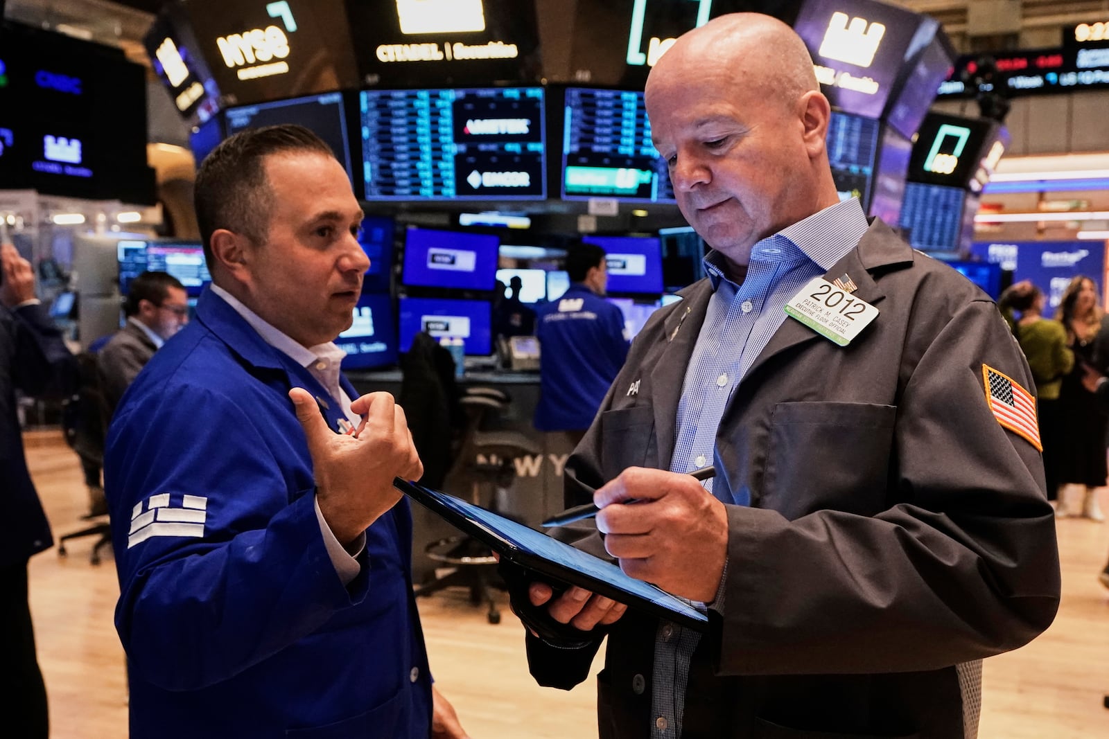 Specialist Gennaro Saporito, left, and trader Patrick Casey work on the floor of the New York Stock Exchange, Thursday, May 29, 2025. (AP Photo/Richard Drew)