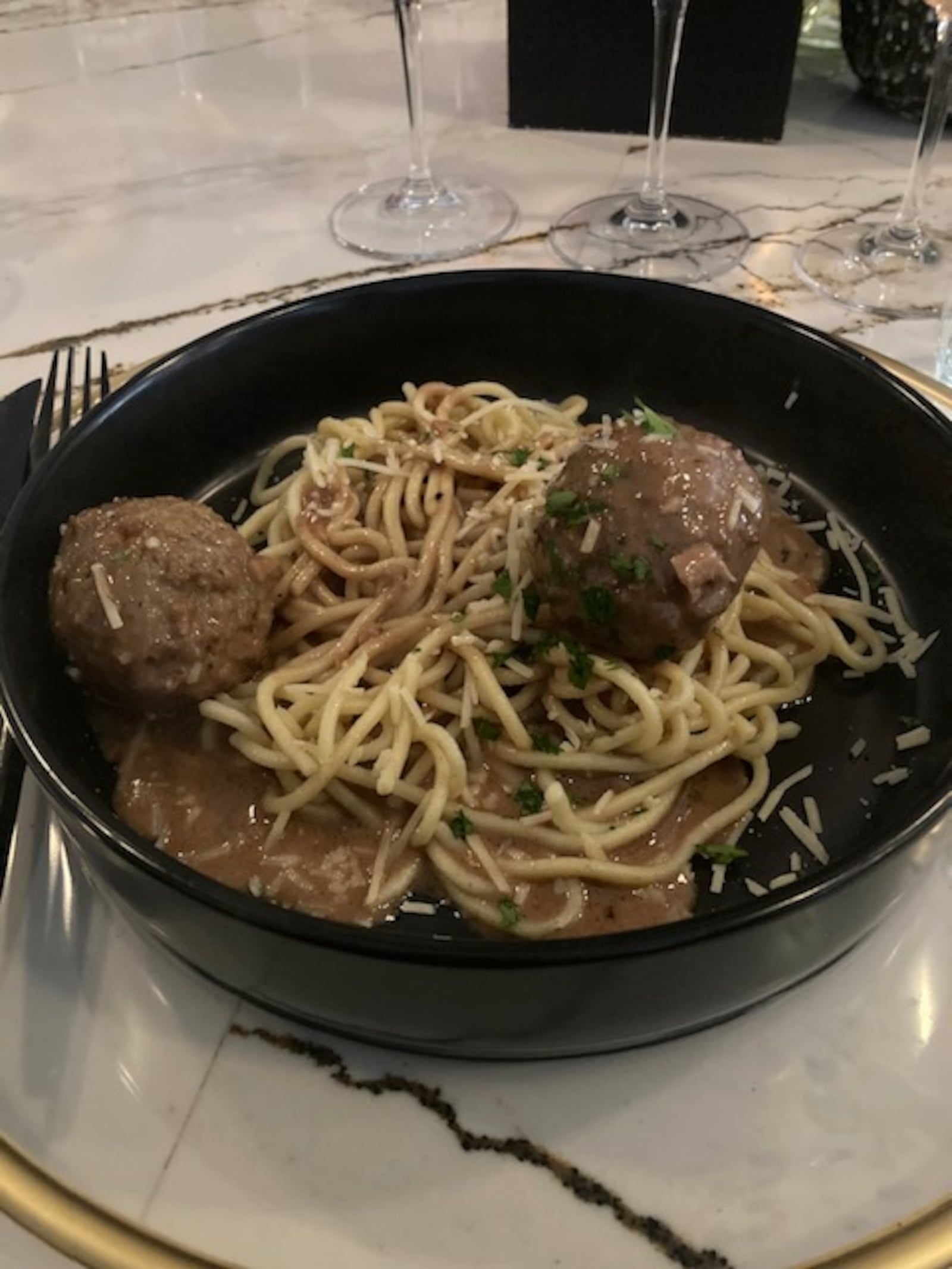 Meatballs with chitarra pasta at Meridien in Centerville. RAY MARCANO/CONTRIBUTED