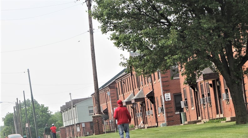 The DeSoto Bass Courts would be transformed under a plan for public housing in West Dayton. CORNELIUS FROLIK / STAFF