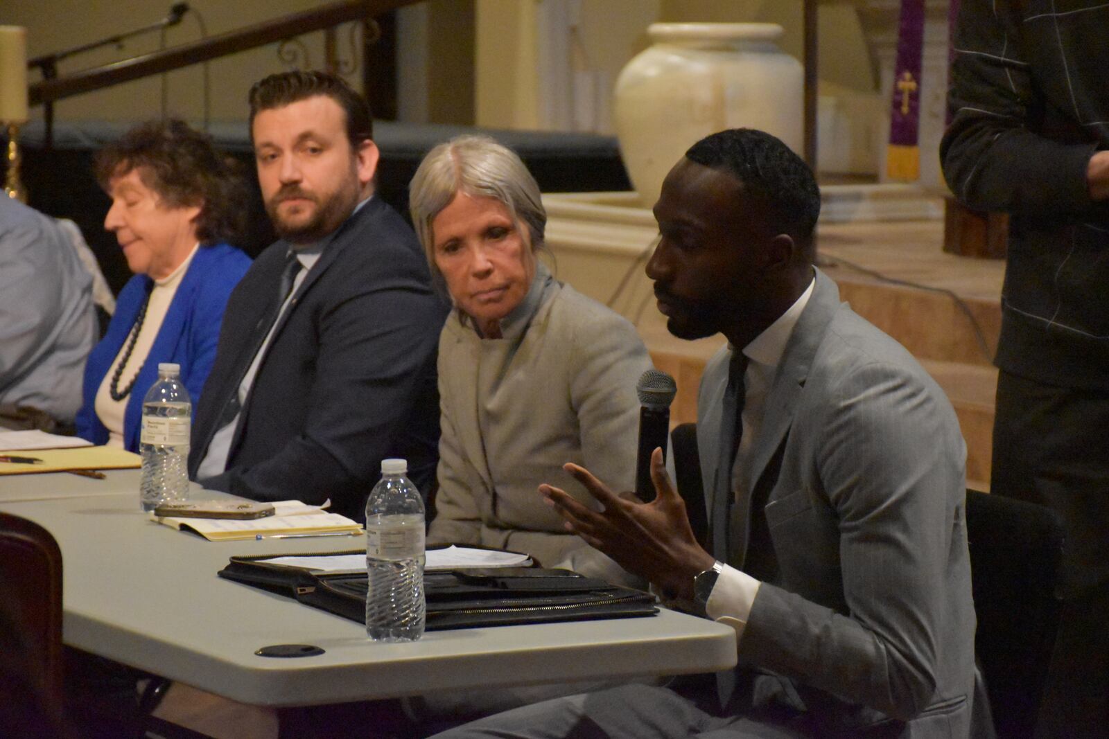 Five people running for the Dayton City Commission took part in a candidate town hall forum hosted by the Dayton unit NAACP on Monday night, March 24, 2025. The candidates included (from right to left) Darius Beckham, Karen Wick, Jacob Davis and Valerie Duncan. Not pictured is incumbent Commissioner Darryl Fairchild. CORNELIUS FROLIK / STAFF
