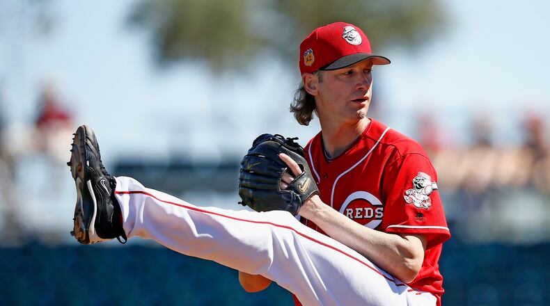 Cincinnati Reds starting pitcher Bronson Arroyo winds up to throw a pitch against the Milwaukee Brewers during the second inning of a spring training baseball game Sunday, March 12, 2017, in Goodyear, Ariz. The Reds defeated the Brewers 4-2. (AP Photo/Ross D. Franklin)