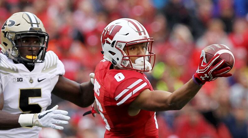 Danny Davis III of the Wisconsin Badgers attempts to make a catch while being guarded by T.J. Jallow of the Purdue Boilermakers in the second quarter at Camp Randall Stadium on October 14, 2017 in Madison, Wisconsin. (Photo by Dylan Buell/Getty Images)