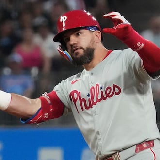 Philadelphia Phillies' Kyle Schwarber celebrates after hitting a double during the seventh inning of a baseball game against the Chicago White Sox in Chicago, Tuesday, July 29, 2025. (AP Photo/Nam Y. Huh)