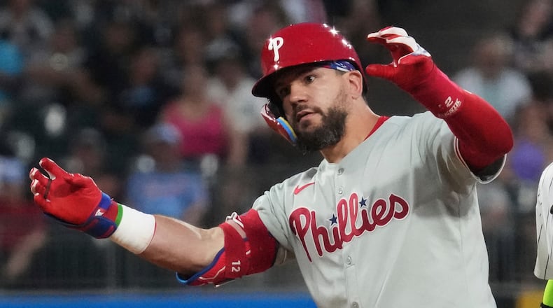 Philadelphia Phillies' Kyle Schwarber celebrates after hitting a double during the seventh inning of a baseball game against the Chicago White Sox in Chicago, Tuesday, July 29, 2025. (AP Photo/Nam Y. Huh)