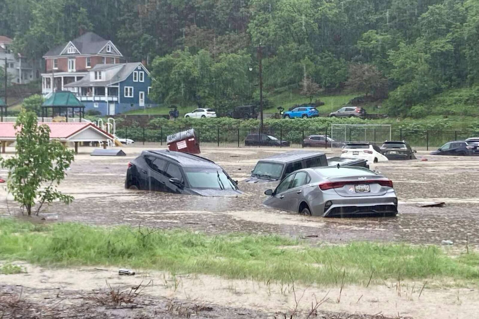 In this photo provided by Alley and Tim Wade, cars can be seen in floodwaters in Westernport, Maryland on Tuesday, May 13, 2025. (Alley and Tim Wade via AP)