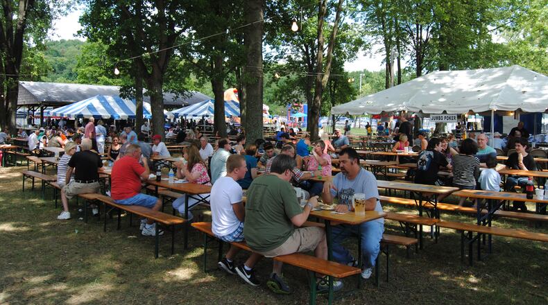 People enjoy the food, beer and music at a past Oktoberfest at Liberty Home Association, located at 2361 Hamilton Cleves Road in Hamilton. FILE PHOTO
