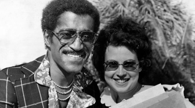 Dayton Daily News columnist and reporter Meredith Moss is pictured with Sammy Davis Jr. in this photo from her days with Phil Donahue Show in Dayton.
