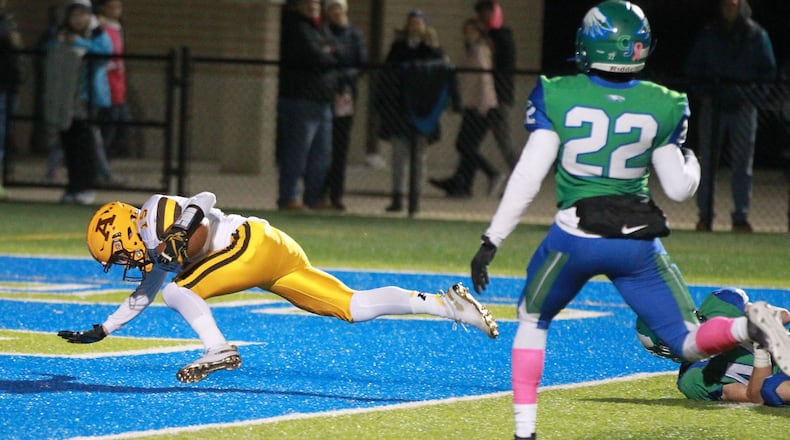 Patrick Connor of Alter (left) beats Jason Ward of Chaminade Julienne (22) to the end zone. Alter defeated host CJ 35-28 in a Week 10 high school football game on Friday, Nov. 1, 2019. MARC PENDLETON / STAFF