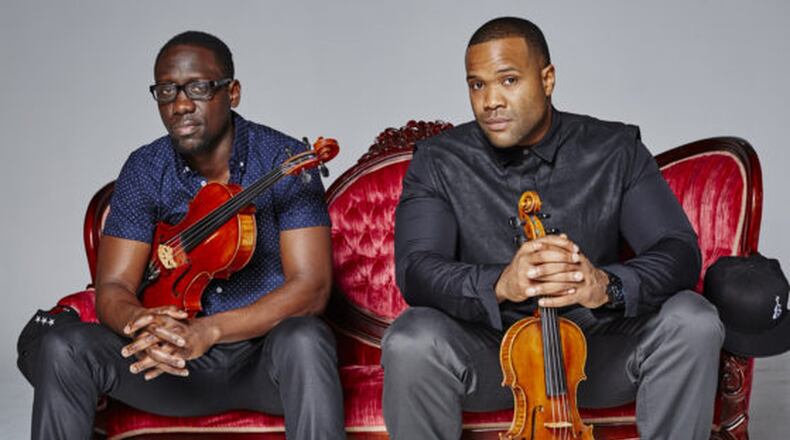 Black Violin, the duo of violist Wil B., left, and violinist Kev Marcus, fuses classical music with hip-hop. They will perform Friday, May 6 at the Schuster Center. CONTRIBUTED
