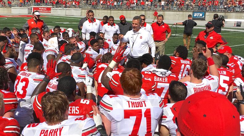 Ohio State coach Urban Meyer talks to his team after the spring game at Ohio Stadium on Saturday, April 16, 2016, in Columbus. David Jablonski/Staff