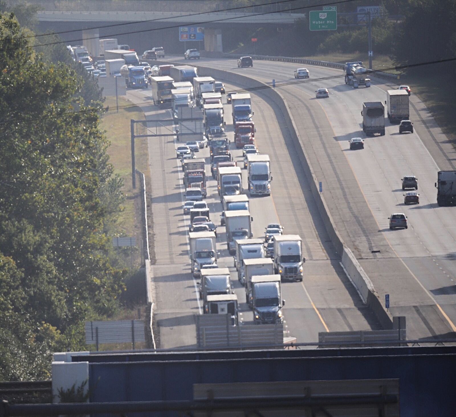 Traffic was still backed up on I-70 west hours after a multi-vehicle crash involving a Fedex semi truck was reported on Tuesday, Sept. 22, 2020, near the I-75 interchange in Huber Heights. STAFF PHOTO / MARSHALL GORBY