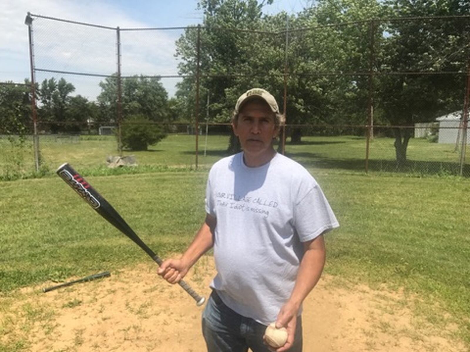 Hassan Abdalla, owner of the Bourbon Street Grill & Cafe who was born in Libya, is helping the First Dayton Little League (FDLL) program in West Dayton. The program has struggled to find enough finances and volunteers in recent years. TOM ARCHDEACON / STAFF