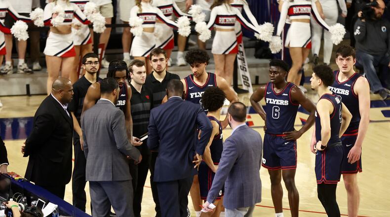 Dayton huddles during a game against Richmond on Saturday, Jan. 27, 2024, at the Robins Center in Richmond, Va. David Jablonski/Staff