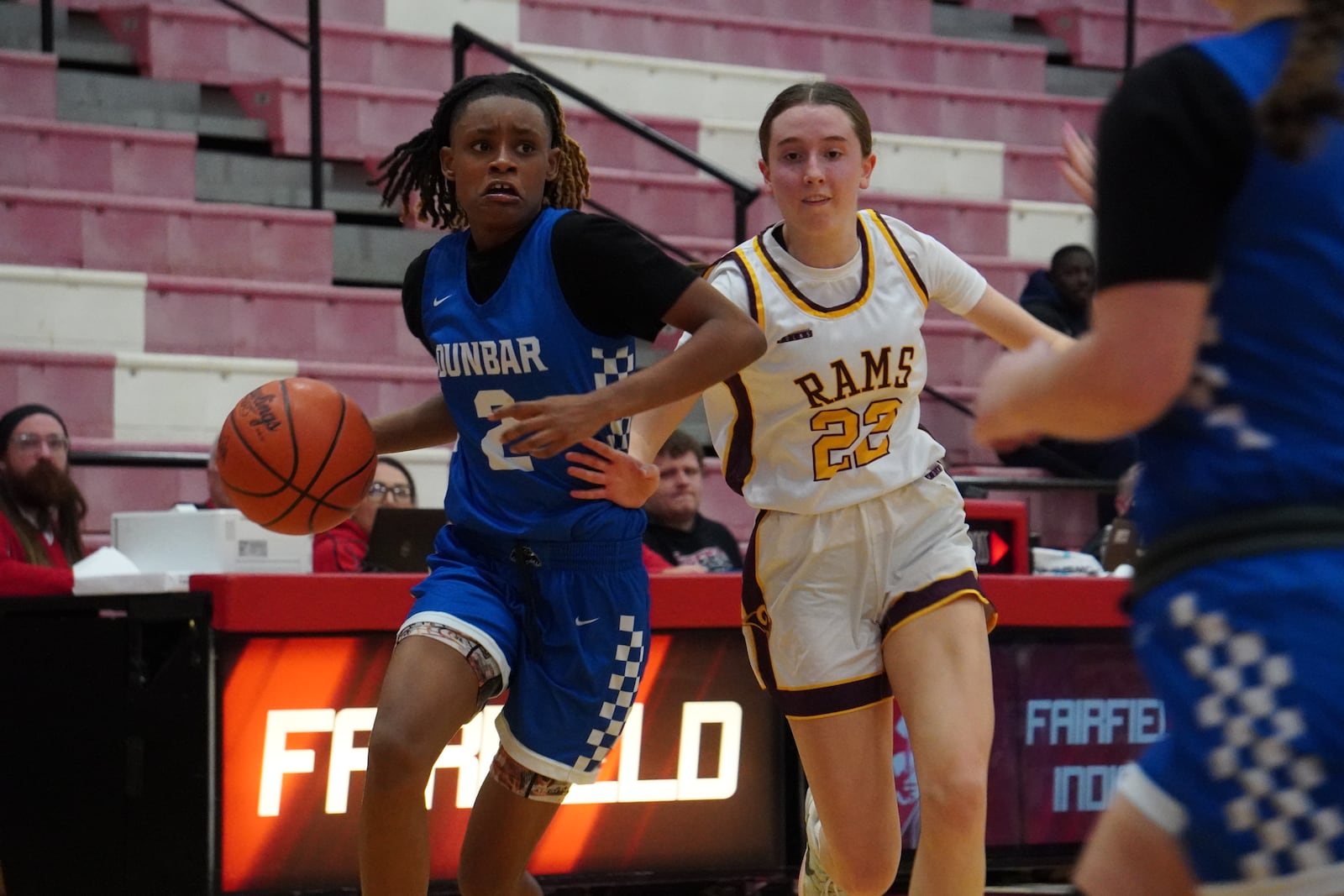 Dunbar’s Aunesty Ramey dribbles the ball against Ross on Saturday at Fairfield Arena. CHRIS VOGT / CONTRIBUTED