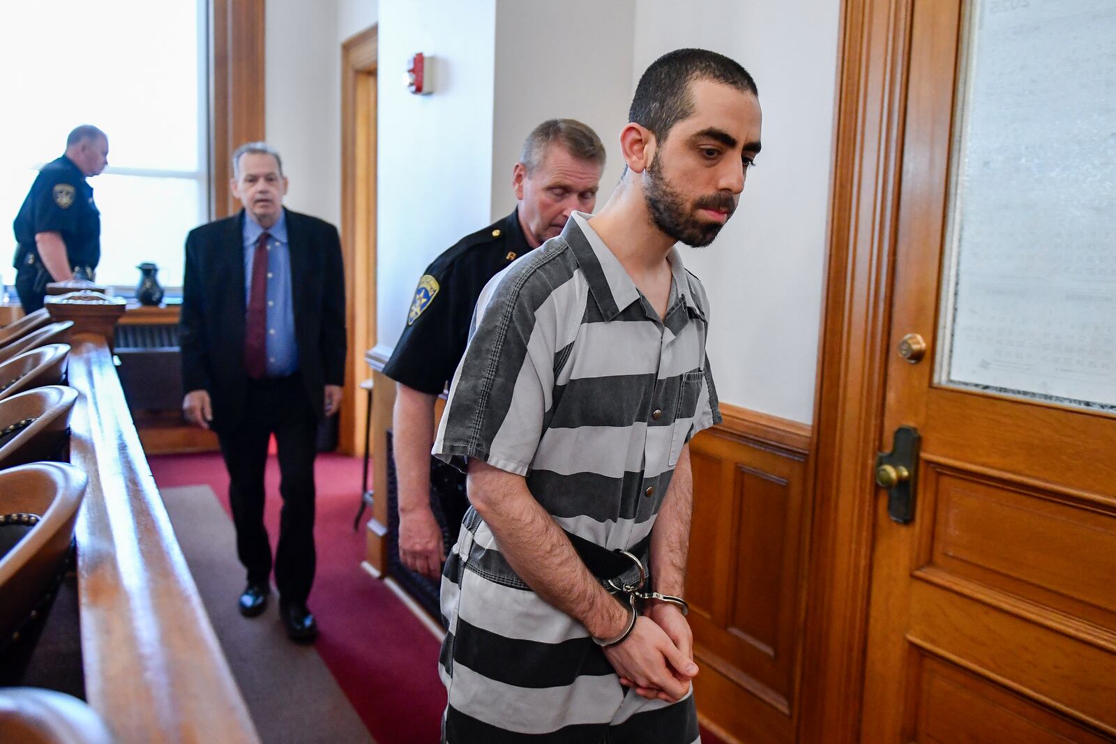 Hadi Matar walks in to in Chautauqua County court in Mayville, N.Y., Friday, May. 16, 2025. (AP Photo/Adrian Kraus)