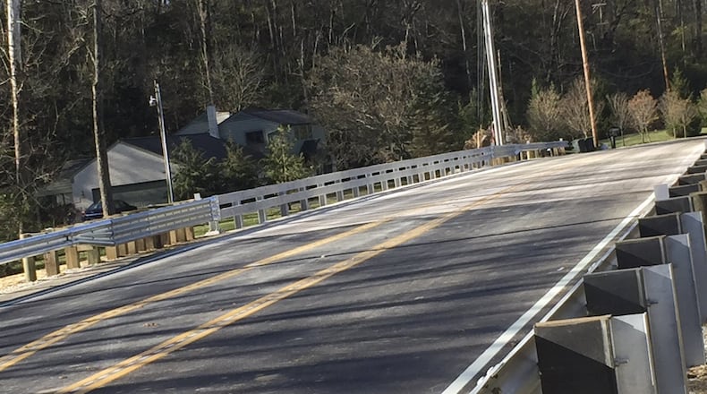 A bridge on Alex-Bell Road over Holes Creek in Washington Twp. has reopened slightly ahead of schedule following a major reconstruction that began in early September. DREW TANNER / STAFF