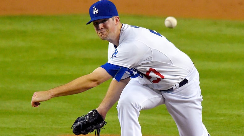 Los Angeles Dodgers starting pitcher Alex Wood throws to the plate during the second inning of a baseball game against the San Diego Padres, Friday, Oct. 2, 2015, in Los Angeles. (AP Photo/Mark J. Terrill)