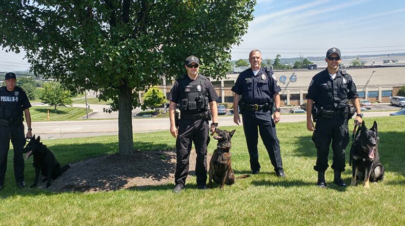 Pictured are Fairfield Police Department’s three K-9 units this past July. CONTRIBUTED