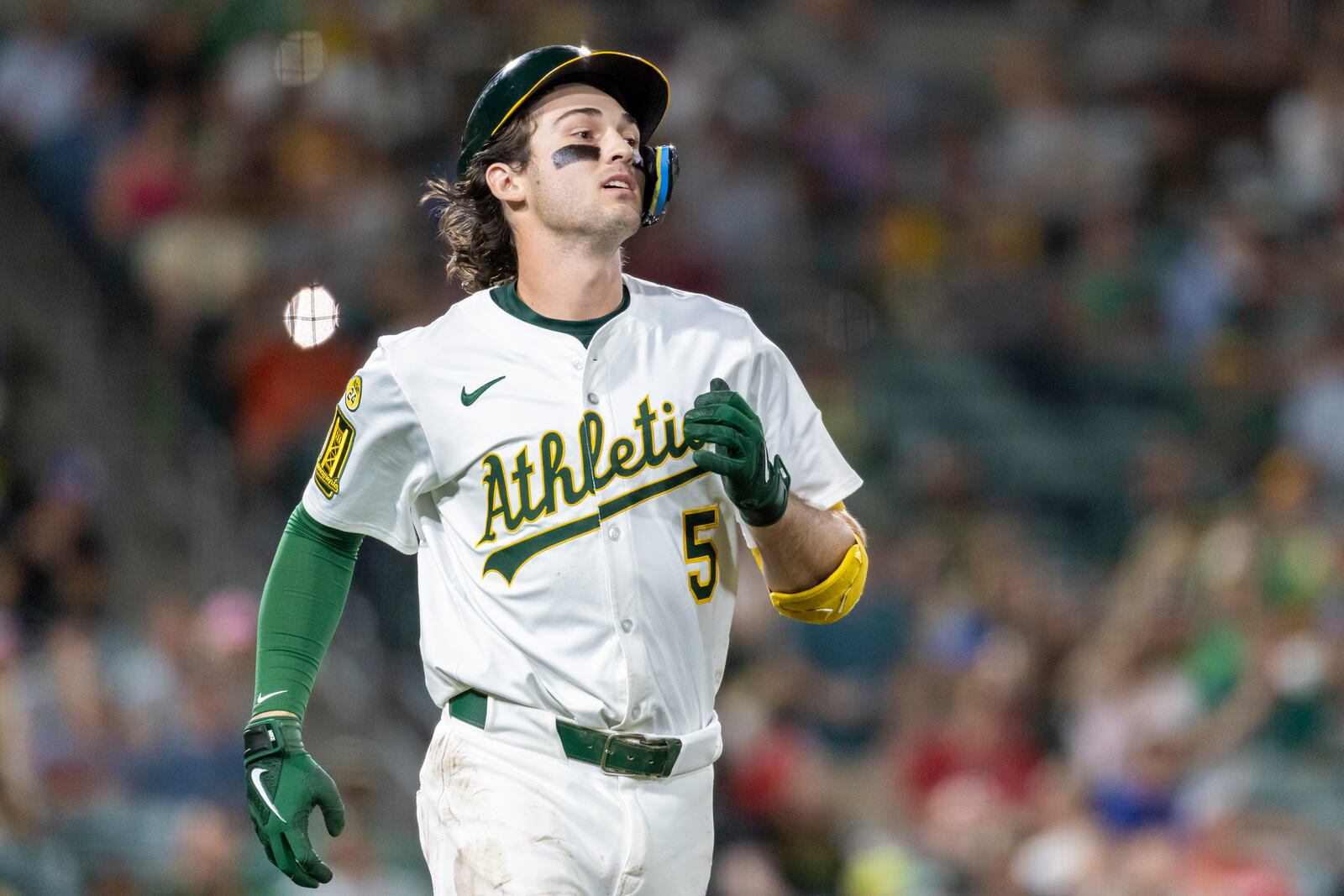 Athletics' Jacob Wilson watches his line drive to first base for an out during the seventh inning of a baseball game against the Cleveland Guardians Saturday, June 21, 2025, in West Sacramento, Calif. (AP Photo/Sara Nevis)