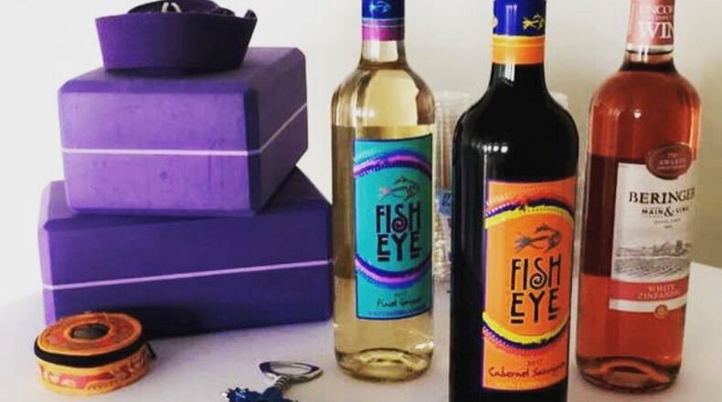 The Wednesday class is designed to be a mid-week unwind in a serene space starting with a glass of wine poured upon arrival. CONTRIBUTED