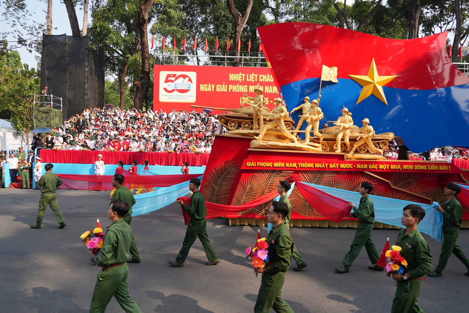 A float with structure commemorating the 50th anniversary of the end of the Vietnam War is marched during a parade in Ho Chi Minh City, Vietnam Wednesday, April 30, 2025. (AP Photo/Hau Dinh)