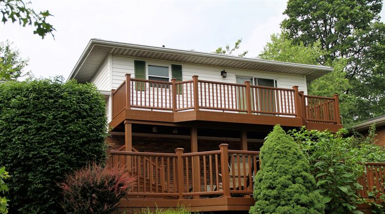 The house sits on a 0.66-acre lot within the Shawnee Trail community.