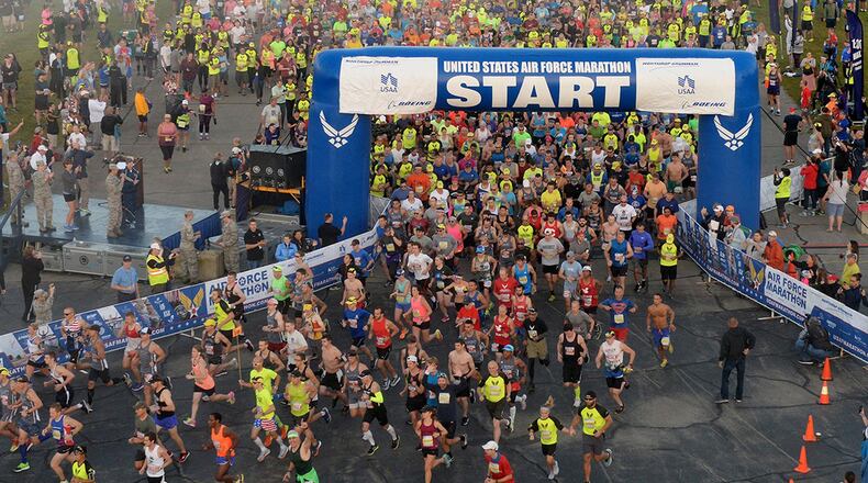 Runners take off for the start of the 21st annual U.S. Air Force Marathon Sept. 16, 2017, at Wright-Patterson Air Force Base. More than 13,500 runners participated in a 5K, 10K, half and full marathon supported by more than 2,400 volunteers. (U.S. Air Force photo/Wesley Farnsworth)