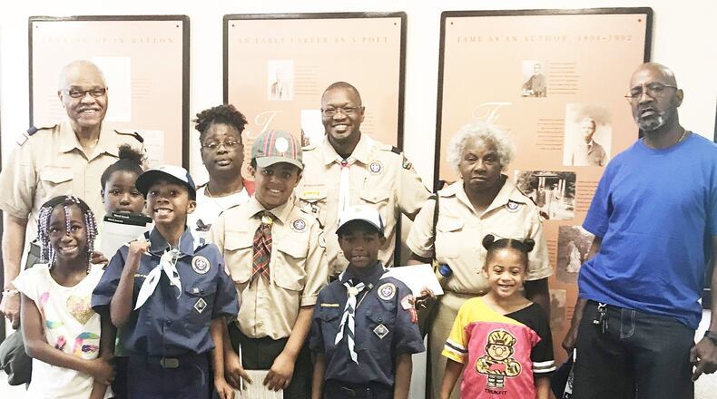 Front row left to right: Passion Swain, Maliya Goodman, Robert Hurt, Devan Donelson Jr., Moses Goodman III, Sophie Donelson, Jesse Walker. Back row left to right: Everett King, Brenda Goodman, Cubmaster Johnnie Freeman, Catherine Head. CONTRIBUTED