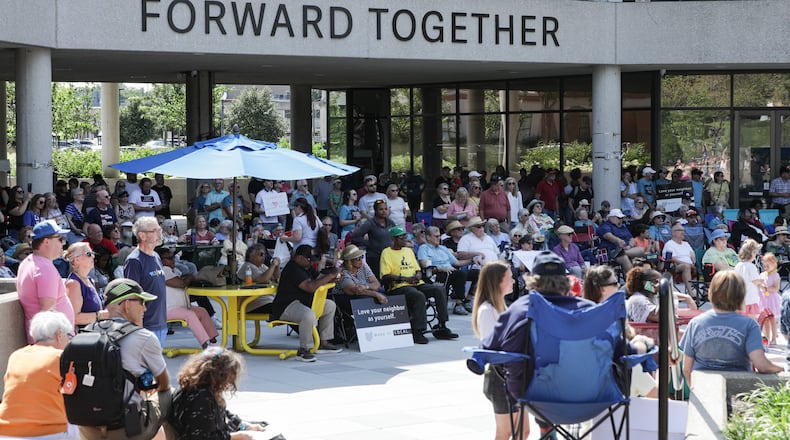 Hundreds of people turned out on Saturday, Aug. 2, on City Hall Plaza in downtown Springfield for "Love Thy Neighbor," which was organized by Springfield G92, a coalition of churches that says it is "committed to the safety and dignity of our Haitian neighbors and friends." Over a dozen people spoke, and two choirs performed. The organization said the goal of the event was to "project love, unity and support for our immigrant neighbors and community." BRYANT BILLING / STAFF