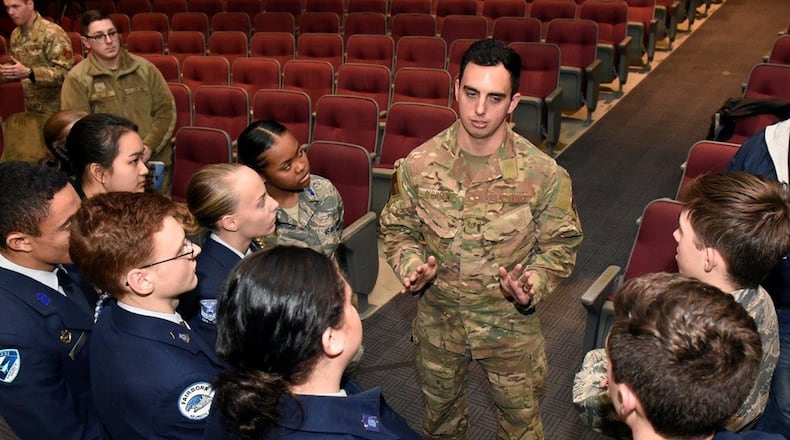 Tech. Sgt. Kenny O’Brien, pararescueman and one of the 12 Outstanding Airmen of the Year in 2019, talks with Air Force Junior ROTC cadets from Fairborn High School at the National Museum of the United States Air Force at Wright-Patterson Air Force Base Feb. 11 after speaking about his Air Force career. (U.S. Air Force photos/Ty Greenlees)