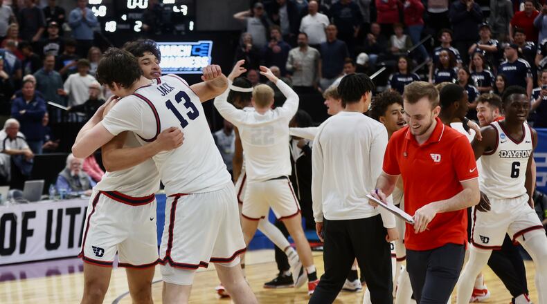 Dayton celebrates a victory against Nevada in the first round of the NCAA tournament on Thursday, March 21, 2024, at the Delta Center in Salt Lake City, Utah. David Jablonski/Staff