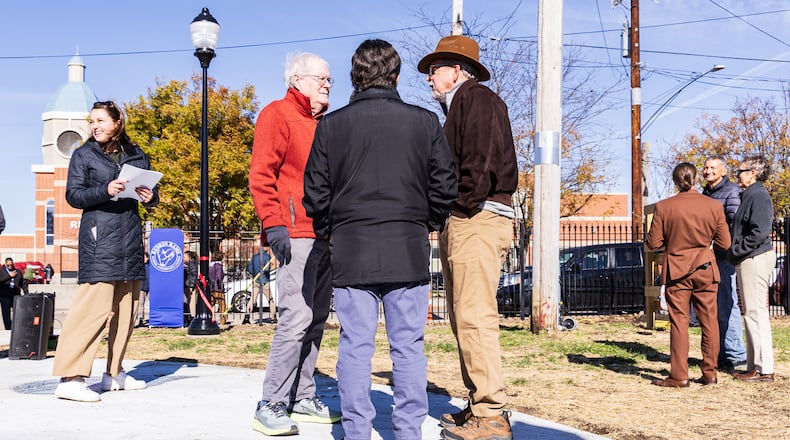The East Dayton Neighborhood Development Corporation, Dayton Public Schools and the city of Dayton held a ribbon cutting ceremony on Wednesday, Nov. 12 at Ruskin Commons, a new area in front of Ruskin Elementary School off of Xenia Avenue in Dayton. The new park features seven mosaics, each with "hope," written in a different language. BRYANT BILLING/STAFF