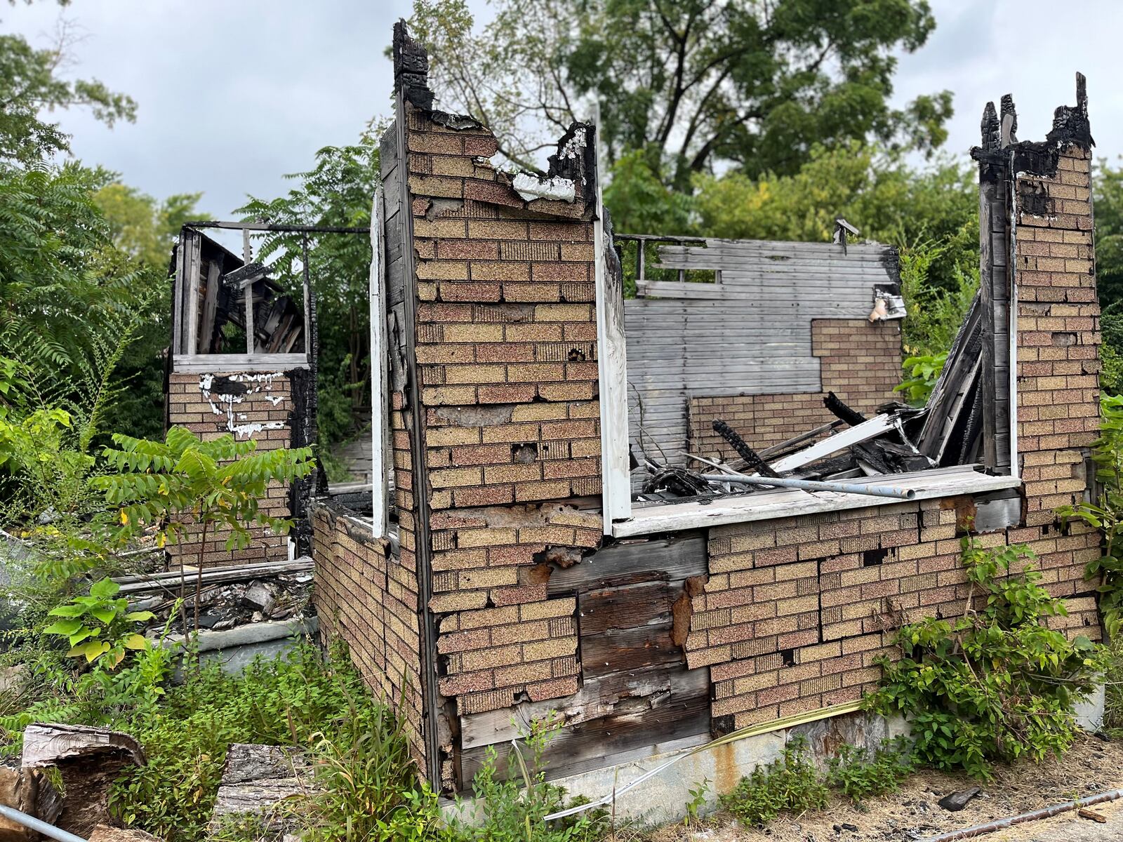 A home on the 800 block of Conners Street in West Dayton that was destroyed by fire a couple of years ago. The home was vandalized and burned down after the owner, Victor Santana, killed two teenagers who were trespassing in his detached garage. Santana was later found guilty of murder. CORNELIUS FROLIK / STAFF