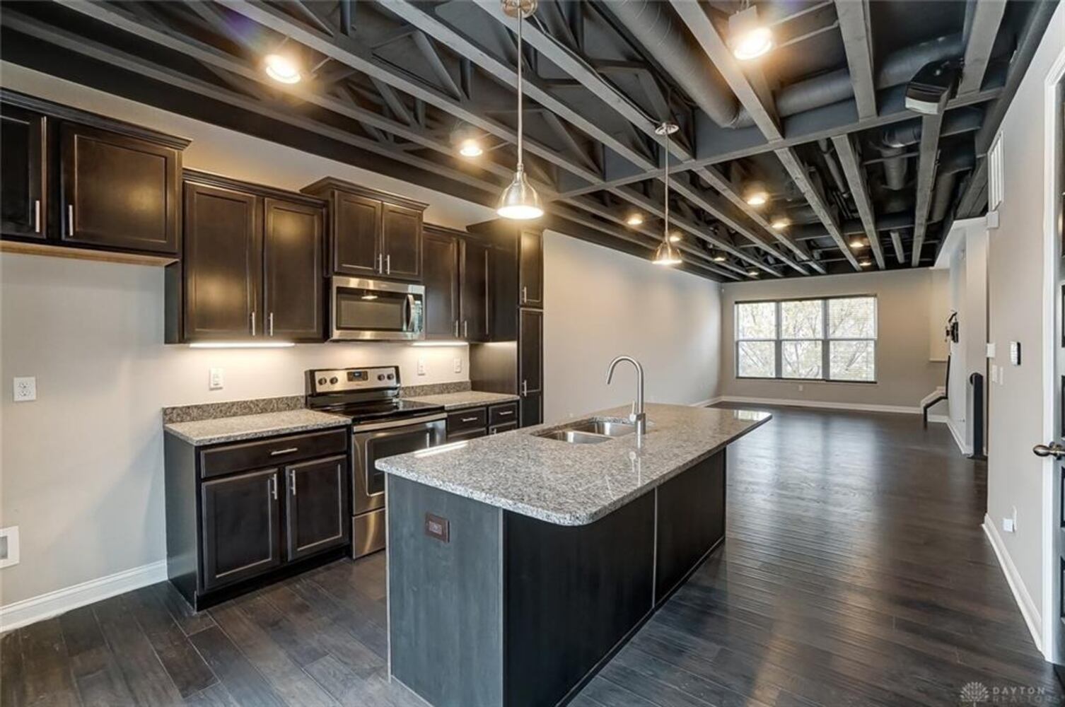 PHOTOS: Downtown Dayton condo with rooftop patio listed for nearly $500K