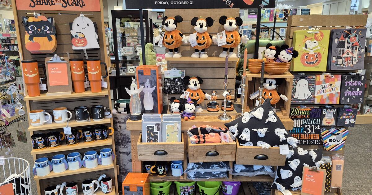 Halloween and Christmas decorations in store aisles