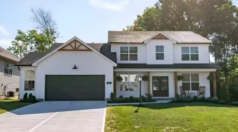 Built in 2022, this custom home features a versatile design floor plan with a first-floor main bedroom, custom bathrooms and spacious loft area that overlooks the open main level floor plan. Listed for $489,900 by Clayton Sears of Better Homes and Gardens Real Estate Big Hill, the two-story home at 20 Sawgrass Pointe Court has about 2,300 square feet of living space. Located within the Sawgrass Pointe subdivision of Springboro, the property includes an oversized, two-car garage and a private back yard with in-ground swimming pool. PHOTOS COURTESY OF DAYTON REALTORS. For other listings, visit DaytonDailyNews.com/homes